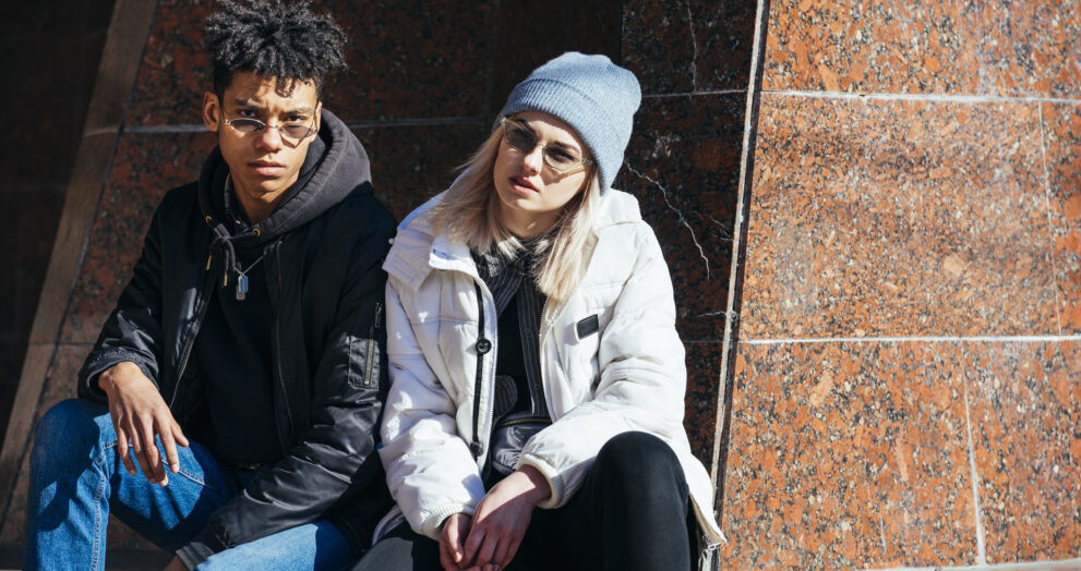 Hoodie outfit ideas styled with jeans, cargo pants, and sneakers for casual streetwear looks.